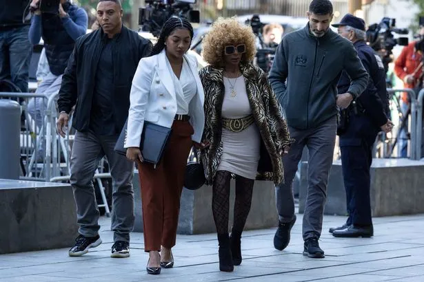 P Diddy's mom Janice, 84, faces hecklers as she arrives at son's court  hearing in huge fur coat - The Mirror US