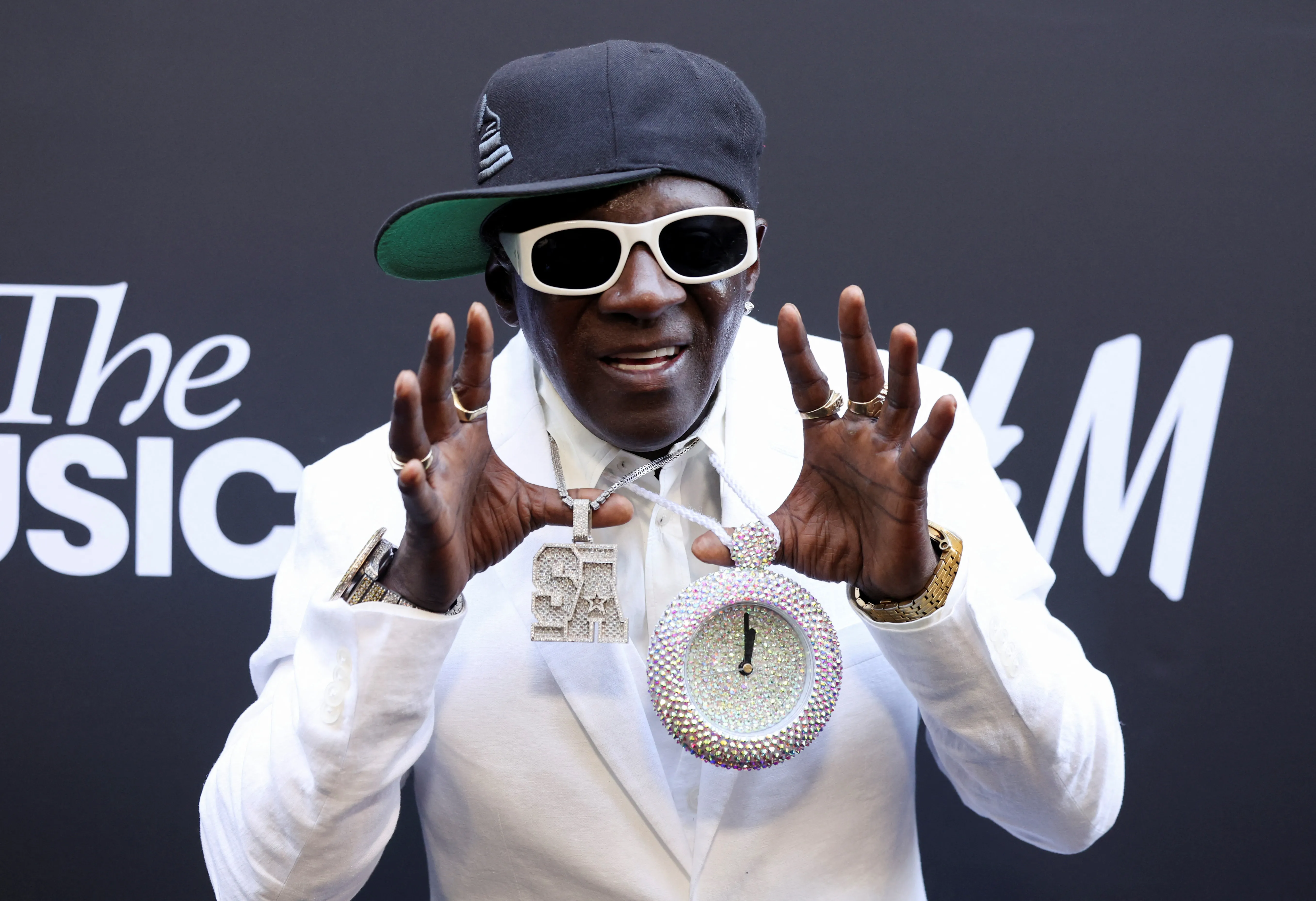 Flavor Flav backs US women's water polo team on road to Paris | Reuters