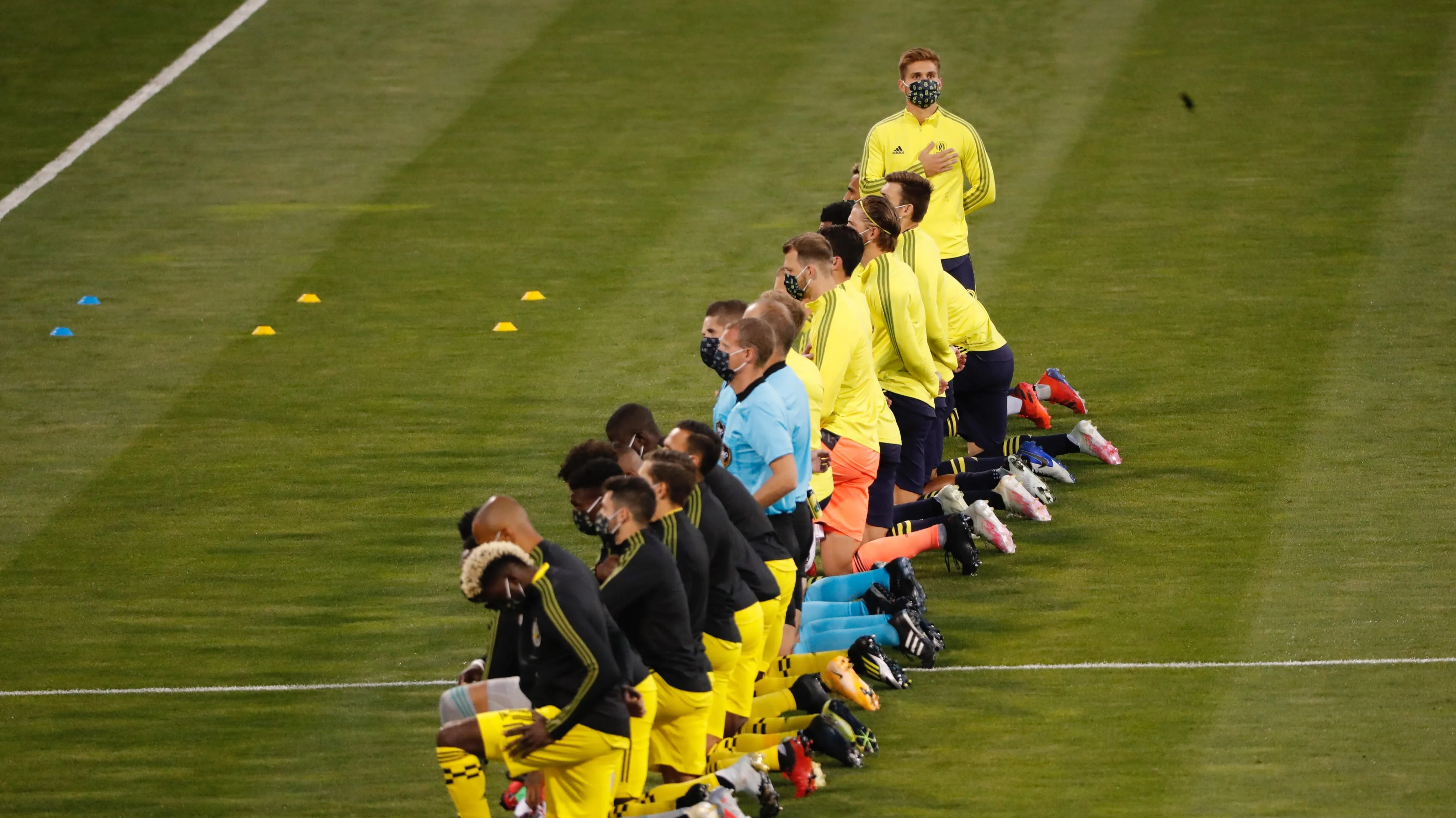 Nashville SC midfielder Alan Winn stands for national anthem vs Columbus