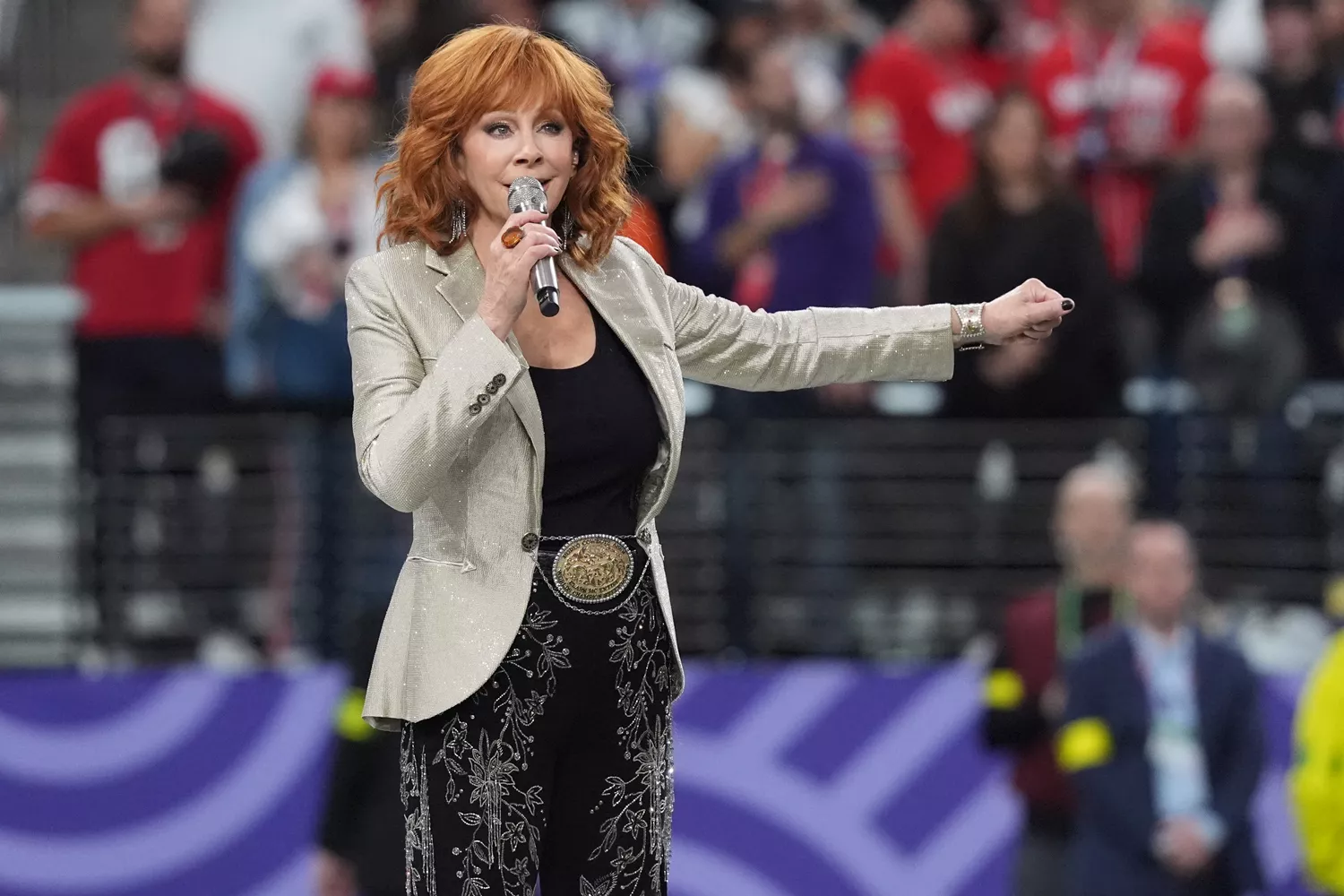 US singer Reba McEntire sings the National Anthem ahead of Super Bowl LVIII between the Kansas City Chiefs and the San Francisco 49ers at Allegiant Stadium in Las Vegas, Nevada, February 11, 2024